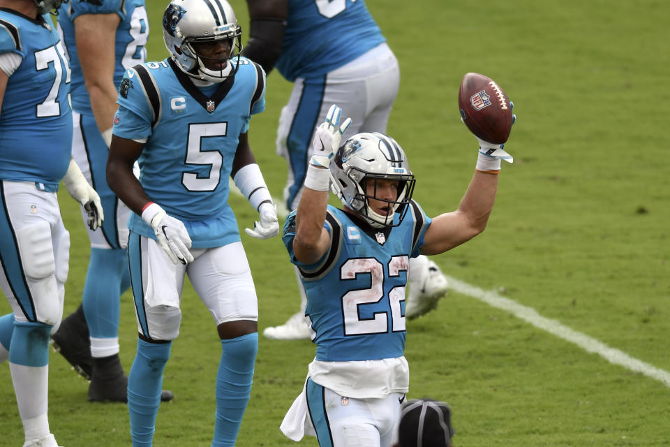 Carolina Panthers running back Christian McCaffrey (22) celebrates after scoring against the Tampa Bay Buccaneers during the second half of an NFL football game Sunday, Sept. 20, 2020, in Tampa, Fla. (AP Photo/Jason Behnken)