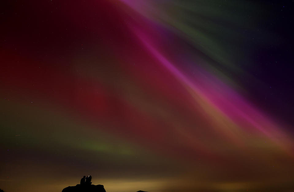 The aurora borealis are seen over The Roaches near Leek, Staffordshire, in Great Britain on May 10, 2024. / Credit: Carl Recine / REUTERS