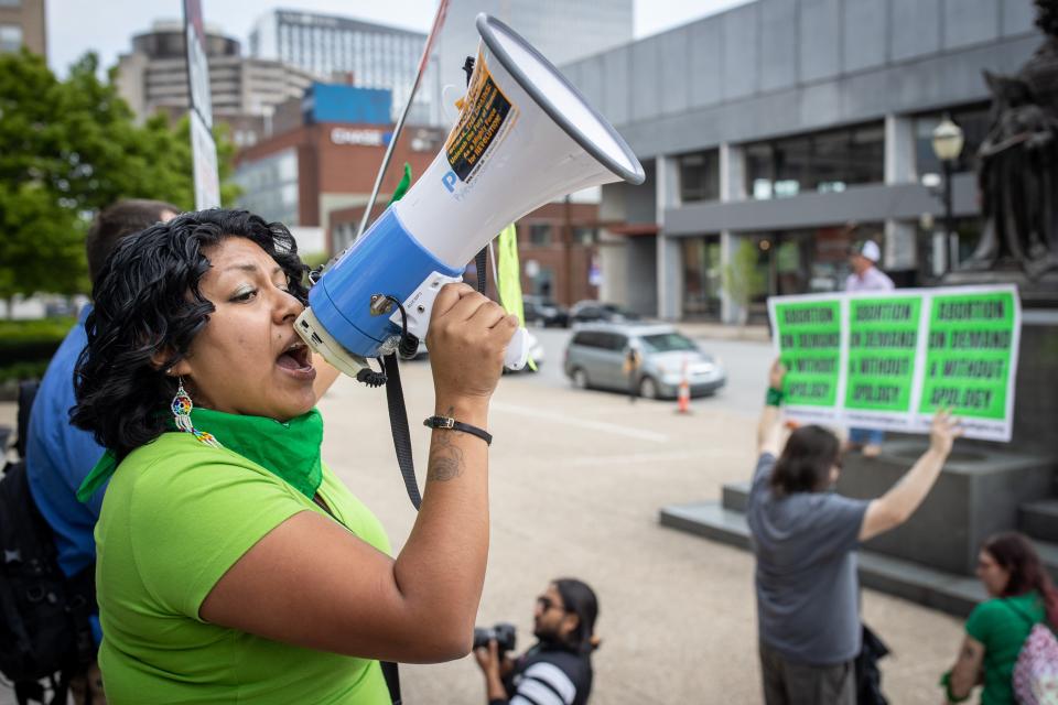 Michelle Xai with Rise up 4 Abortion Rights leads chants against  Kentucky's sweeping new abortion law outside Louisville Metro Hall on April 21, 2022. A federal judge temporarily blocked the law while the protest was underway.