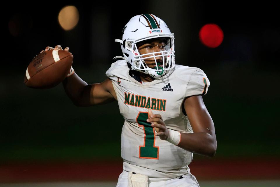 Mandarin quarterback Tramell Jones (1) throws the ball against Bolles on Sept. 2.