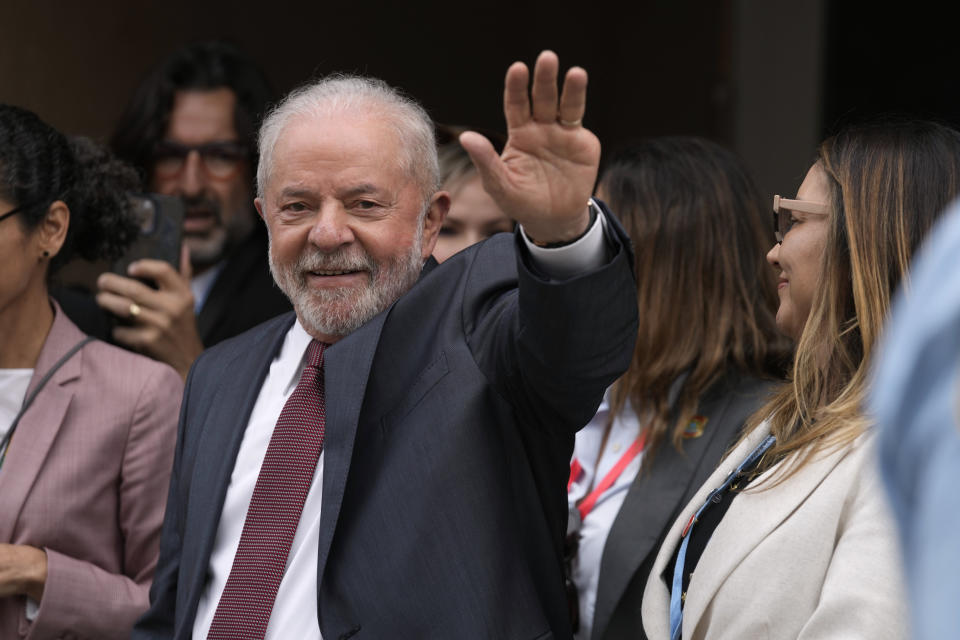 Brazilian President-elect Luiz Inacio Lula da Silva waves as he leaves a session at the COP27 U.N. Climate Summit, Wednesday, Nov. 16, 2022, in Sharm el-Sheikh, Egypt. (AP Photo/Peter Dejong)