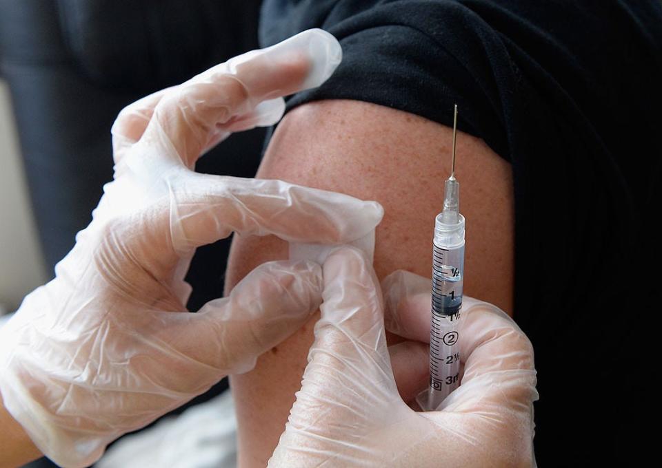 People receive a free meningitis vaccine.