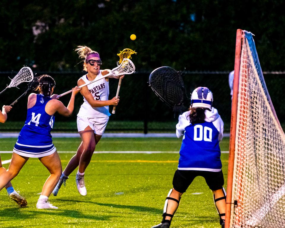 Bishop Stang's Sydney Plouffe fires on goal.