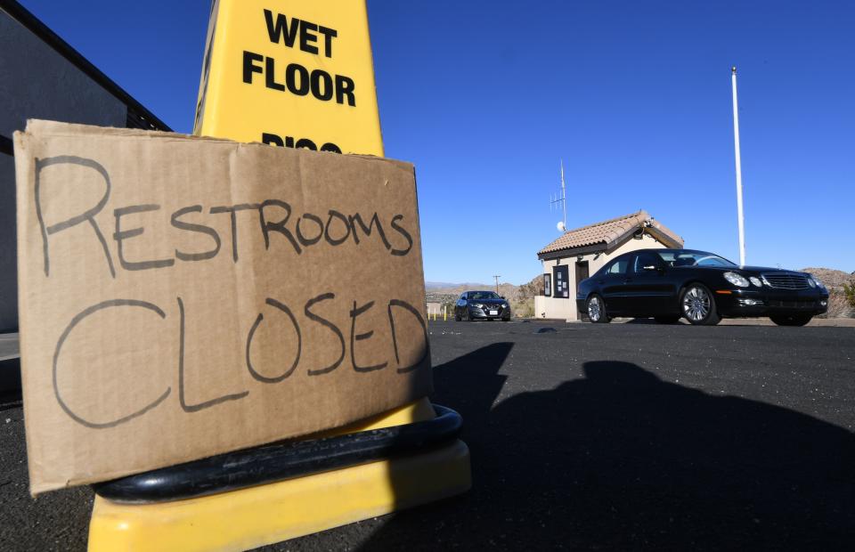 Tourists drive past the closed entrance ticket station of the Joshua Tree National Park after the federal government’s partial shutdown caused park rangers to stay home and campgrounds to be shut, at the park in California, on Jan. 3, 2019. (Photo: Mark Ralston/AFP/Getty Images)