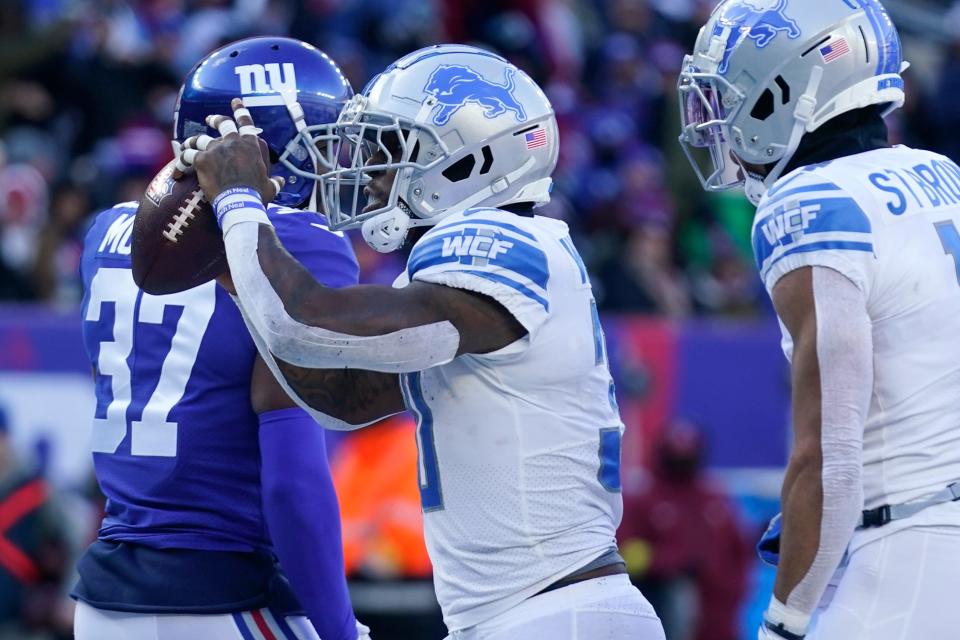 Lions running back Jamaal Williams (30) reacts after running in a touchdown during the first half against the Giants on Sunday, Nov. 20, 2022, in East Rutherford, N.J.