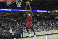 Miami Heat forward Jimmy Butler goes up for a shot in the first half of an NBA basketball game against the Memphis Grizzlies, Wednesday, Nov. 8, 2023, in Memphis, Tenn. (AP Photo/Brandon Dill)