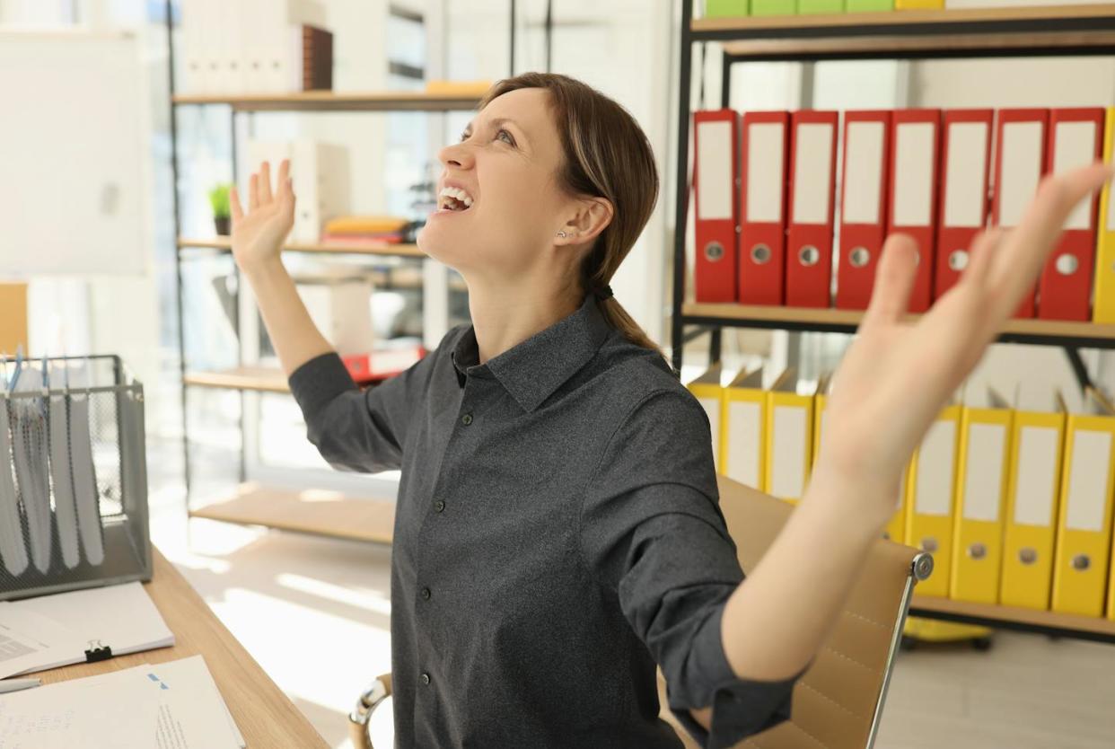 A sense of calling can provide workers a feeling of higher purpose in their jobs. <a href="https://www.gettyimages.com/detail/photo/emotional-woman-feels-happy-to-finish-working-on-royalty-free-image/1728919751?phrase=personally+rewarding+work&searchscope=image%2Cfilm&adppopup=true" rel="nofollow noopener" target="_blank" data-ylk="slk:megaflopp/Getty Images;elm:context_link;itc:0;sec:content-canvas" class="link ">megaflopp/Getty Images</a>