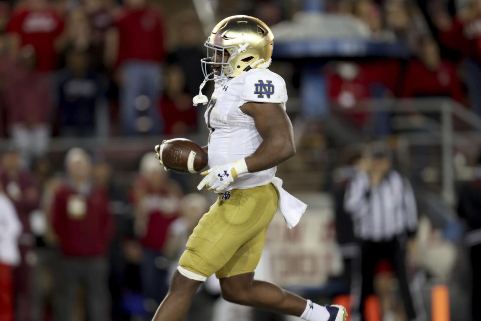 Notre Dame running back Audric Estime runs for a touchdown against Stanford during the first half of an NCAA college football game in Stanford, Calif., Saturday, Nov. 25, 2023. (AP Photo/Jed Jacobsohn)