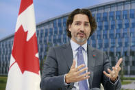 Canada's Prime Minister Justin Trudeau speaks during a bilateral meeting with NATO Secretary General Jens Stoltenberg on the sidelines of a NATO summit at NATO headquarters in Brussels, Monday, June 14, 2021. U.S. President Joe Biden is taking part in his first NATO summit, where the 30-nation alliance hopes to reaffirm its unity and discuss increasingly tense relations with China and Russia, as the organization pulls its troops out after 18 years in Afghanistan. (Stephanie Lecocq, Pool via AP)