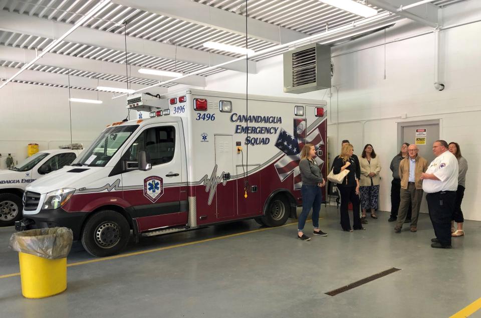 Canandaigua Emergency Squad Chief Matt Sproul explains the need for larger space for ambulance vehicles, some of which had to be parked outside at the former base.