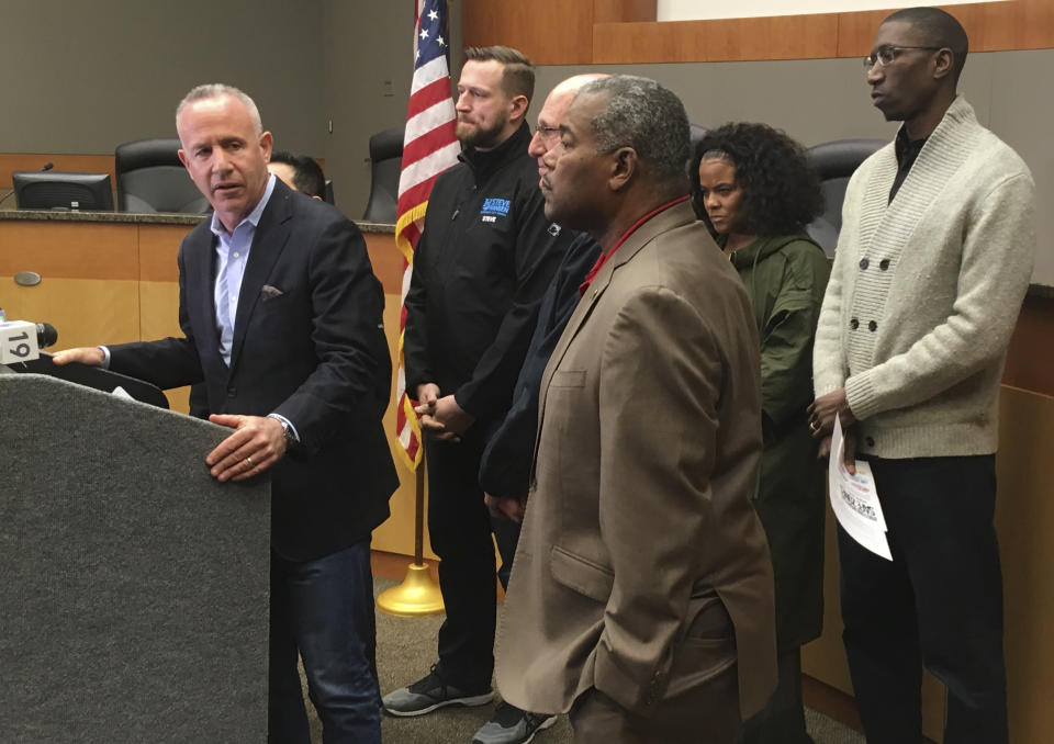 In this March 2, 2019 photo Sacramento Mayor Darrell Steinberg apologizes at City Hall, for Sacramento police officers' fatal shooting of 22-year-old Stephon Clark nearly a year ago after they erroneously thought the black vandalism suspect was pointing a gun. He's backed by city council members and pastors advocating peaceful change. Steinberg is among a growing number of officials saying California should toughen its legal standard for when officers can use deadly force. (AP Photo/Don Thompson)