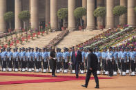 U.S. President Donald Trump walks after reviewing a guard of honor during a ceremonial reception at Rashtrapati Bhavan, the Indian Presidential Palace, in New Delhi, India, Tuesday, Feb. 25, 2020. (AP Photo/Alex Brandon)