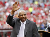 FILE PHOTO: Hall of Famer Frank Robinson waves to the crowd before the start of the Major League Baseball's Civil Rights game between the Cincinnati Reds and the St. Louis Cardinals at Great American Ball Park in Cincinnati, Ohio, May 15, 2010. REUTERS/John Sommers II