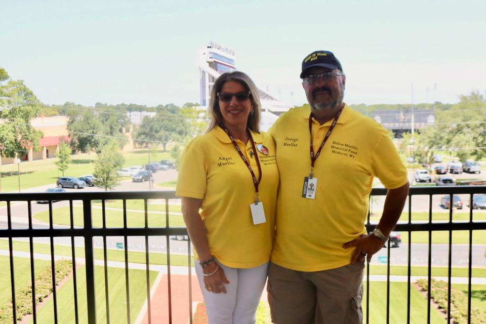 Angel and George Mueller pose at Edward Via College of Osteopathic Medicine in Louisiana. They were invited to talk about epinephrine access and training to over 300 medical students.