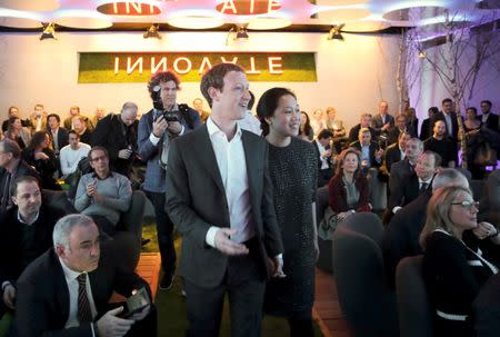 Facebook founder and CEO Mark Zuckerberg arrives with his wife Priscilla Chan for the awards ceremony of the newly established Axel Springer Award in Berlin, Germany, February 25, 2016. REUTERS/Kay Nietfeld/Pool