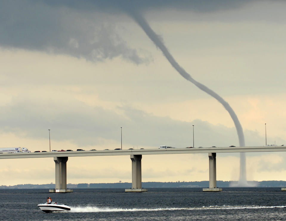 A large waterspout forms above the St. Johns River in Jacksonville, Fla. on Friday afternoon, June 26, 2009. (AP Photo/The Florida Times-Union, Will Dickey)