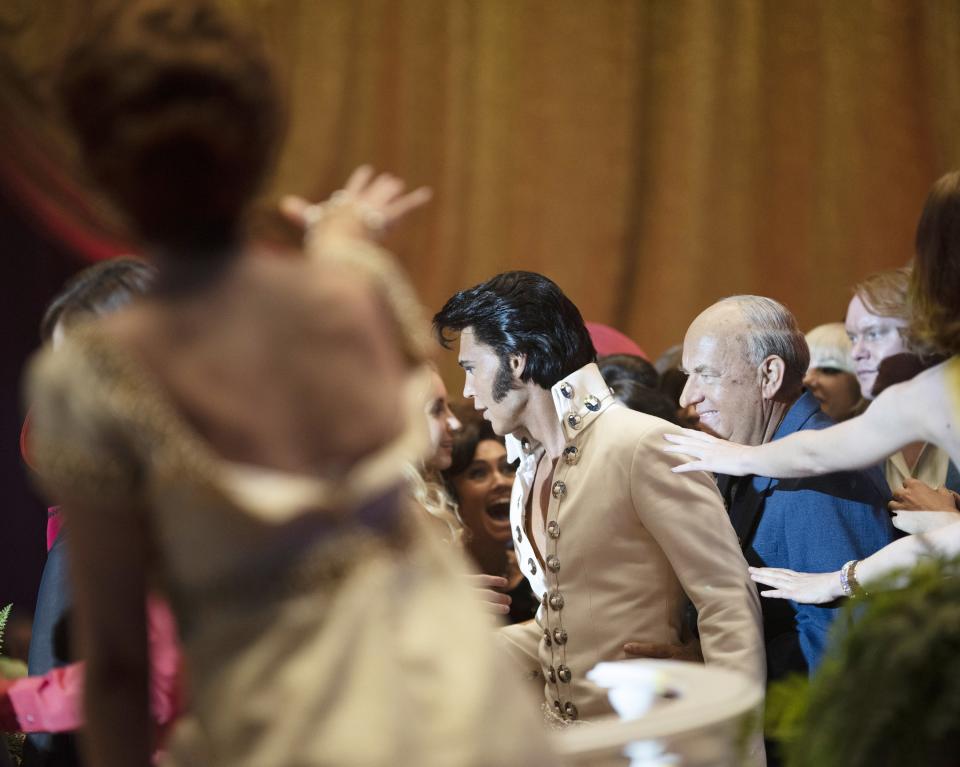 From left: Austin Butler as Elvis Presley and Tom Hanks as Colonel Tom Parker in Baz Luhrmann’s “Elvis.” - Credit: Hugh Stewart/Warner Bros./Courtesy Everett Collection