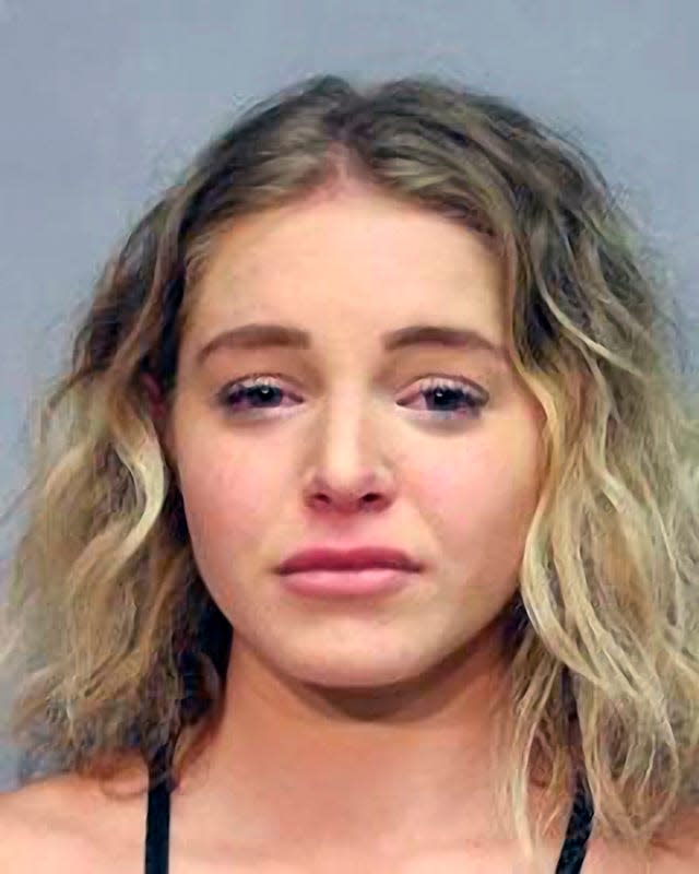 This photo provided by the Hawaii Police Department shows Courtney Clenney. Law enforcement in Hawaii on Wednesday, Aug. 10, 2022 arrested social media model Courtney Clenney on a charge of second-degree murder with a deadly weapon.