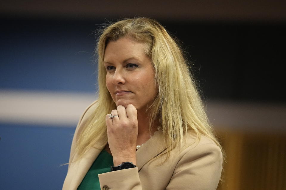 FILE - Attorney Ashleigh Merchant looks on in court, Feb. 27, 2024, in Atlanta. On Wednesday, March 6, Merchant, the lawyer who initiated the effort to remove Fulton County District Attorney Fani Willis from the Georgia election interference case against former President Donald Trump, walked state lawmakers through her investigation into Willis' romantic relationship with a special prosecutor and why she believes it creates a conflict of interest. (AP Photo/Brynn Anderson, Pool, File)