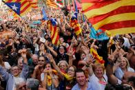 <p>People celebrate after Catalonia’s parliament voted to declare independence from Spain on Oct. 27, 2017. (Photo: Pau Barrena/AFP/Getty Images) </p>