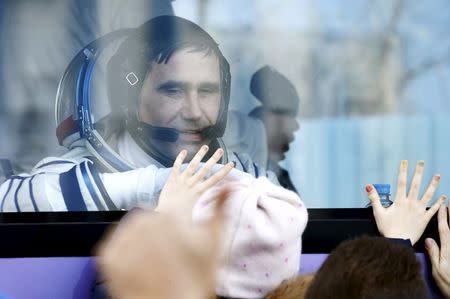 Member of the International Space Station expedition 46/47, Russian cosmonaut Yuri Malenchenko during a sending-off ceremony at the Baikonur cosmodrome in Kazakhstan, 15 December 2015. REUTERS/Maxim Shipenkov/Pool