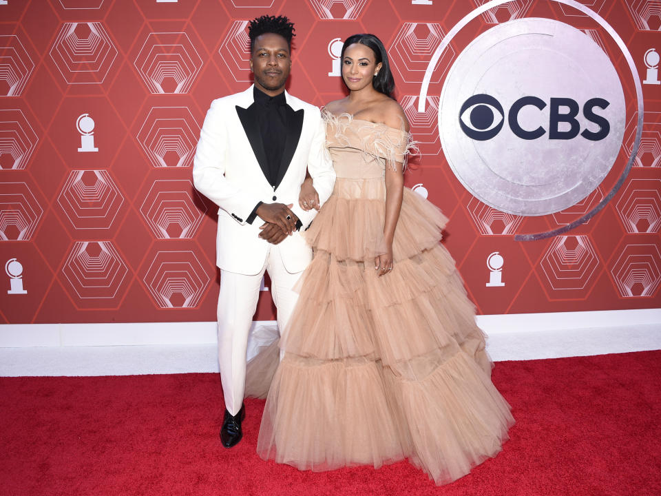 Leslie Odom Jr., left, and Nicolette Robinson arrive at the 74th annual Tony Awards at Winter Garden Theatre on Sunday, Sept. 26, 2021, in New York. (Photo by Evan Agostini/Invision/AP)