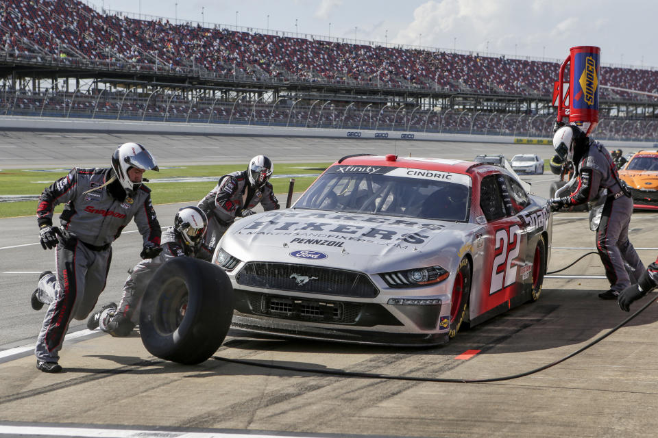 Austin Cindric makes a pit stop during the NASCAR Xfinity Series auto race at Talladega Superspeedway on Saturday, April 24, 2021, in Talladega, Ala. (AP Photo/Butch Dill)