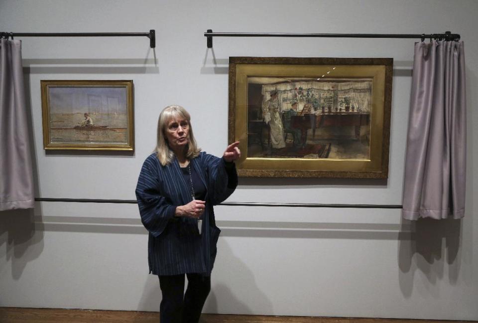 In this Tuesday Feb. 21, 2017 photo, Kathleen A Foster, Senior Curator of American Art at the Philadelphia Museum of Art speaks in front of two watercolor paintings in Philadelphia. "American Watercolor in the Age of Homer and Sargent" will be on view from March 1 to May 14, 2017, bringing together masterpieces drawn from public and private collections throughout the county, and will be shown only in Philadelphia. (AP Photo/Jacqueline Larma)
