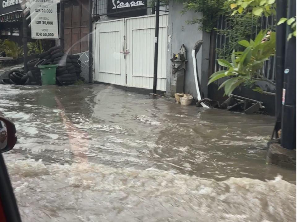 A view of a flooded street in Bali.