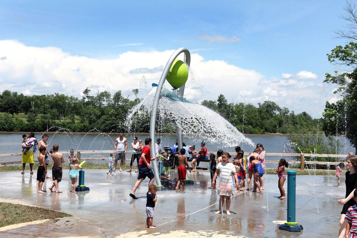 Water dropped on kids as they played Saturday on the Splash Pad at Jacobson Park.