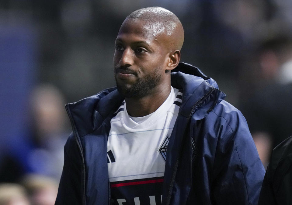 Vancouver Whitecaps' Fafa Picault leaves the pitch after being injured during the first half of the team's MLS soccer match against the LA Galaxy on Saturday, April 13, 2024, in Vancouver, British Columbia. (Darryl Dyck/The Canadian Press via AP)