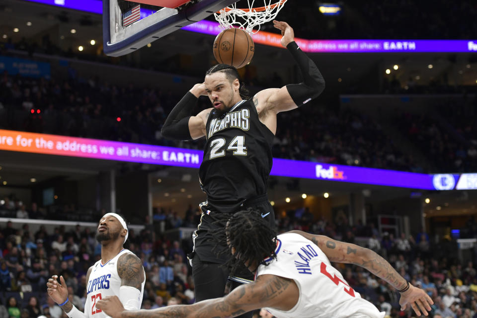 Memphis Grizzlies forward Dillon Brooks (24) dunks over Los Angeles Clippers guard Bones Hyland (5) in the second half of an NBA basketball game Friday, March 31, 2023, in Memphis, Tenn. (AP Photo/Brandon Dill)
