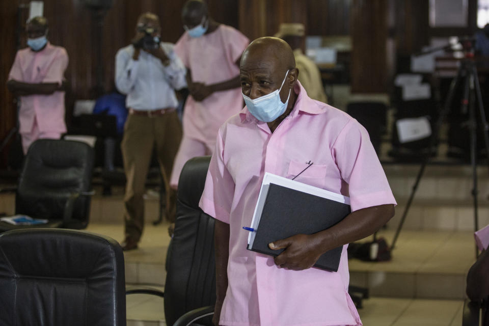 Paul Rusesabagina, who inspired the film "Hotel Rwanda" and is credited with saving more than 1,000 people by sheltering them at the hotel he managed during the genocide, attends a court hearing in Kigali, Rwanda Friday, Feb. 26, 2021. The judge on Friday rejected Rusesabagina's argument in his terrorism trial that a court there cannot try him because he is no longer a citizen. (AP Photo/Muhizi Olivier)