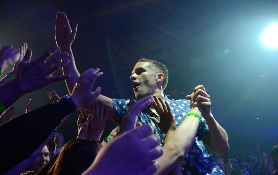 Brandon Flowers has made it big with “The Killers.” But way back in the early 2000s, he was making $5 tips from Charles Barkley. (Photo by Kevin Mazur/Getty Images)