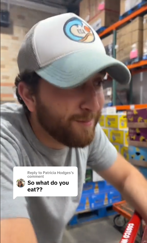 A person wearing a cap is in a store aisle. Text reads: "Reply to Patricia Hodges's comment: So what do you eat??"