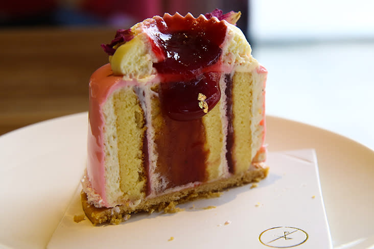 Once you cut into the 'Orange Blossom', you can appreciate the layers of the strawberry jam and cream within this inverted 'roll' cake that uses a 'choux' pastry biscuit sponge method.