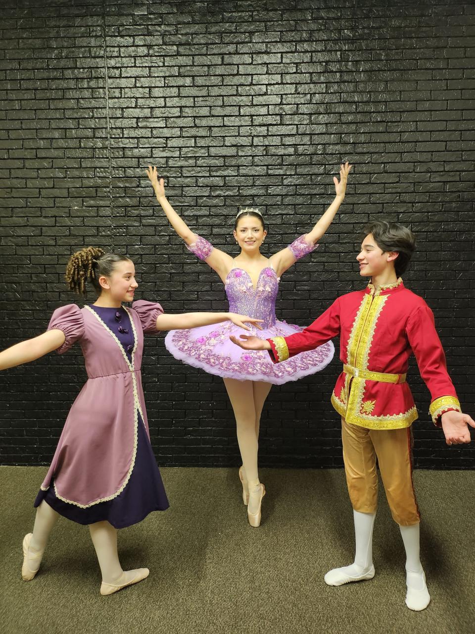 From left, Ariella Telles, portraying Clara; Emily Evans, portraying the Sugar Plum Fairy; and Jaxx Creek, portraying the Prince rehearse for the upcoming production of Lone Star Ballet's "The Nutcracker," to be held Dec. 8-10 at the Amarillo Civic Center Auditorium.