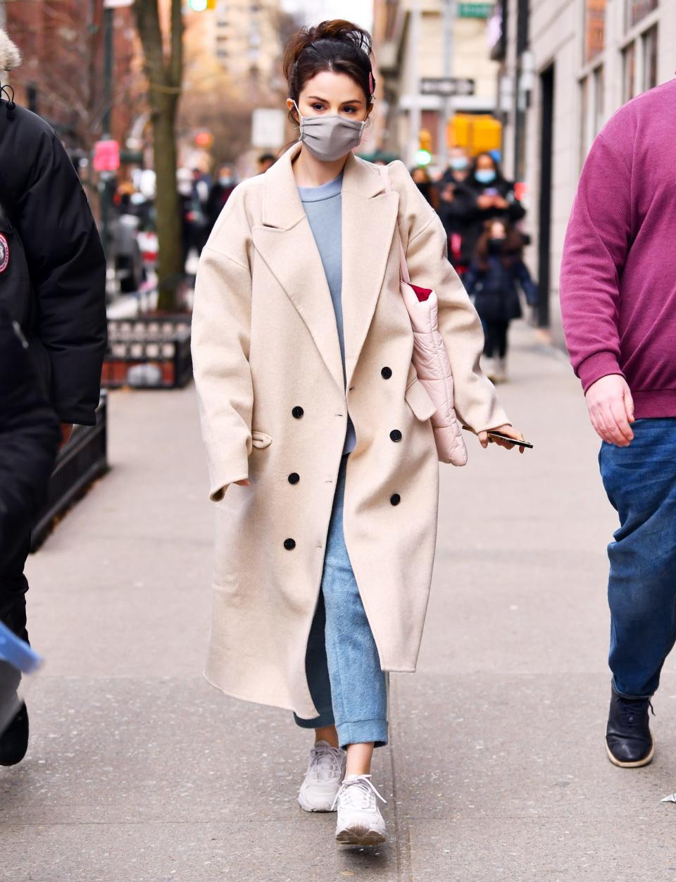 <p>Selena Gomez makes the sidewalk her catwalk in New York City on Sunday.</p>