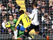 Newcastle United goalkeeper Tim Krul (L) makes a save from Tottenham Hotspur's Roberto Soldado (R) during their English Premier League soccer match at White Hart Lane in London November 10, 2013.