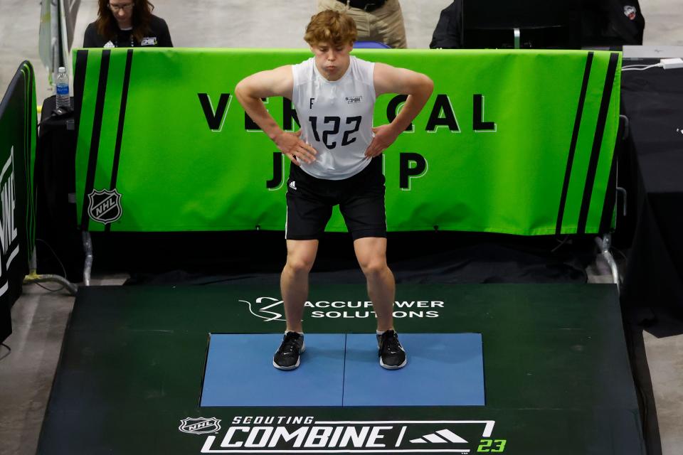 William Smith participates in the vertical jump during the NHL hockey combine, Saturday, June 10, 2023, in Buffalo, N.Y. (AP Photo/Jeffrey T. Barnes)