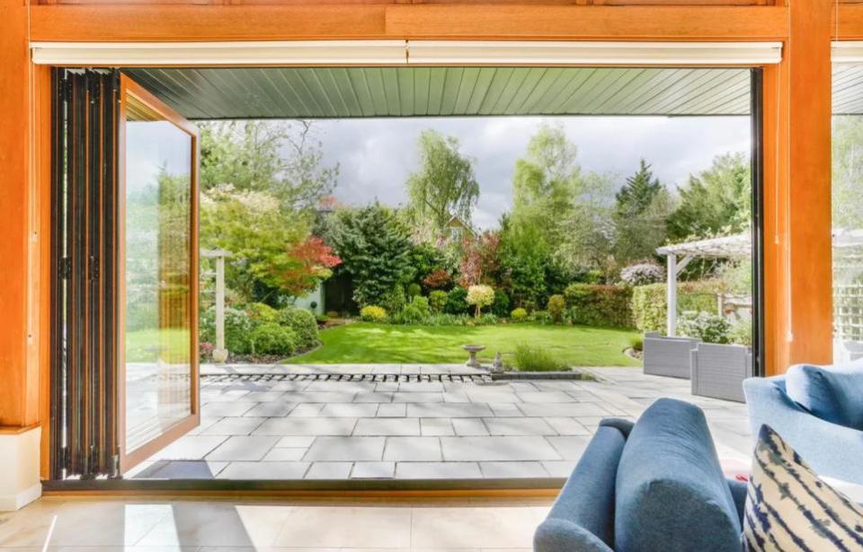 Your Local Guardian: Folding doors open out onto the patio and garden