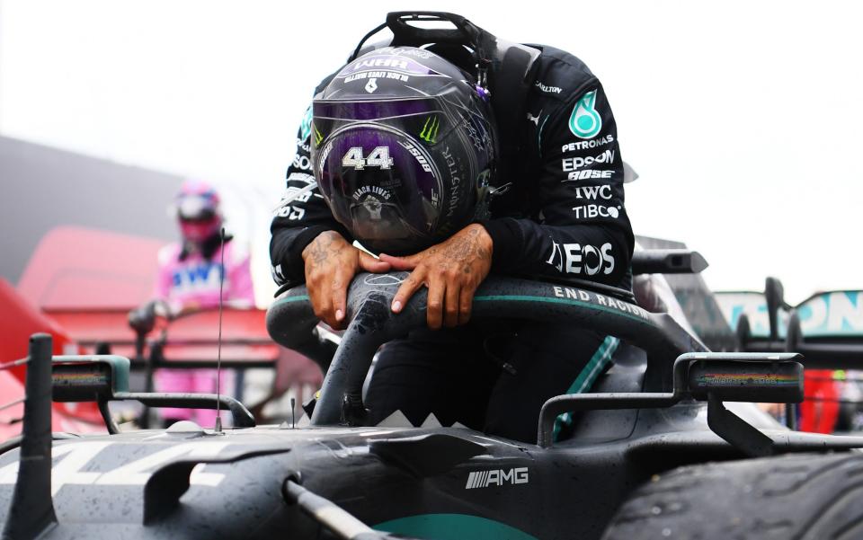 Race winner Lewis Hamilton of Great Britain and Mercedes GP celebrates winning a 7th F1 World Drivers Championship in parc ferme during the F1 Grand Prix of Turkey - Getty Images