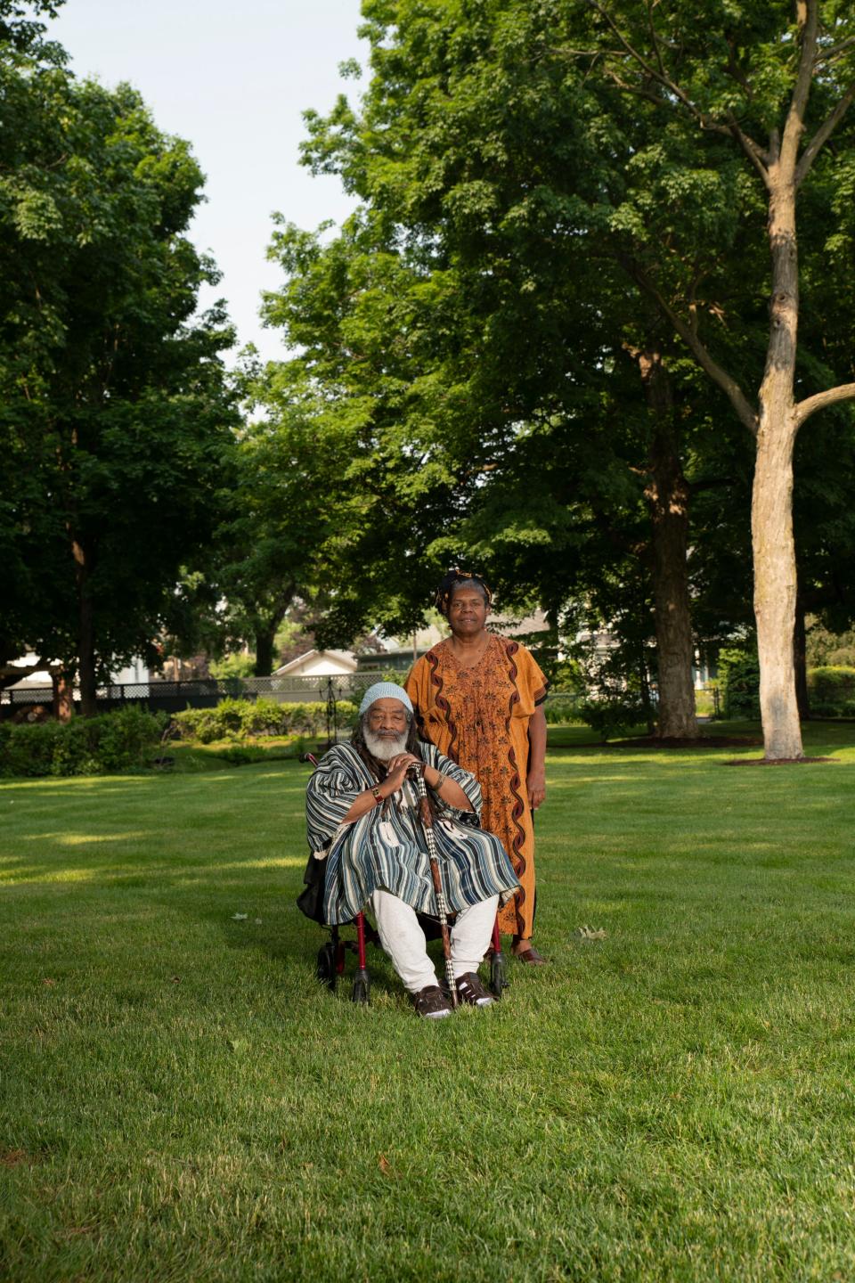 Verge “Brother Sage” Gillam and his wife, Charlotte Pfeifer, pose for a portrait in the garden of The History Museum in South Bend on Wednesday, June 7, 2023.