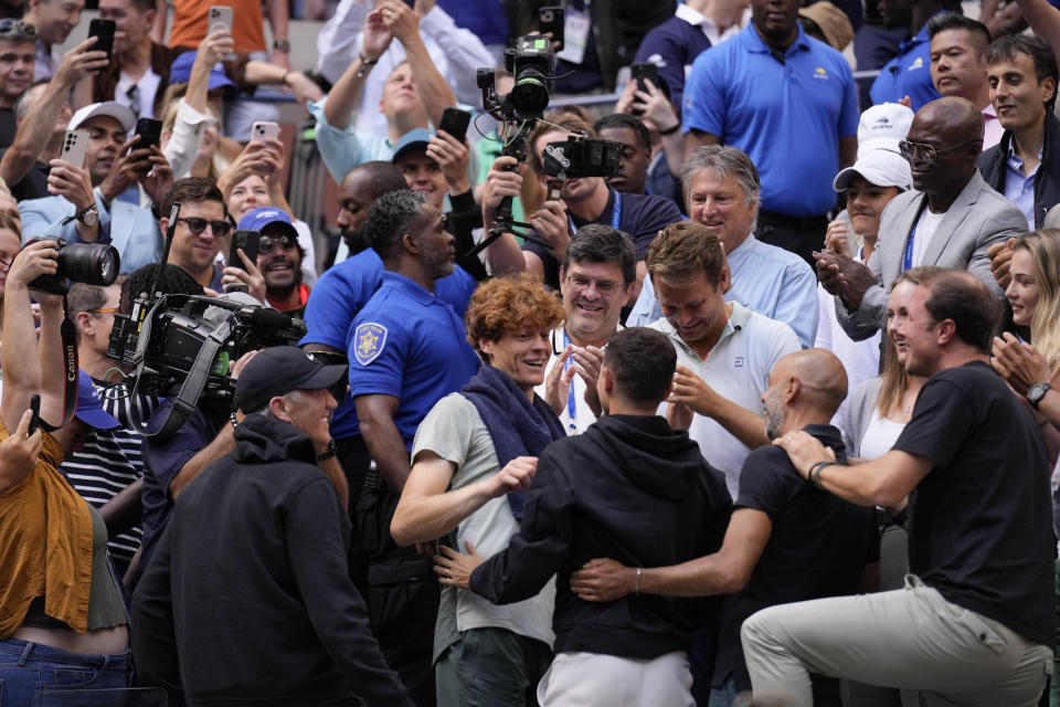 Jannik Sinner, of Italy, celebrates after defeating Taylor Fritz, of the United States, to win the men's singles final of the U.S. Open tennis championships, Sunday, Sept. 8, in New York. 2024. (AP Photo/Seth Wenig)