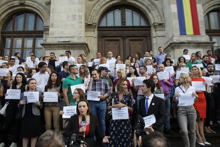 Romanian magistrates hold a silent protest in support of an independent judiciary in capital Bucharest, Romania, September 16, 2018. Inquam Photos/Octav Ganea via REUTERS