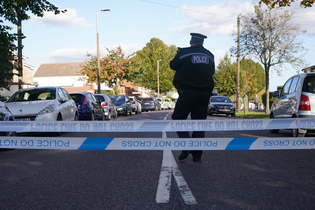 A police officer at the scene near the Belfairs Methodist Church in Eastwood Road North, Leigh-on-Sea, Essex, where Conservative MP Sir David Amess has died after he was stabbed several times at a constituency surgery. A man has been arrested and officers are not looking for anyone else. Picture date: Friday October 15, 2021. (PA Wire)