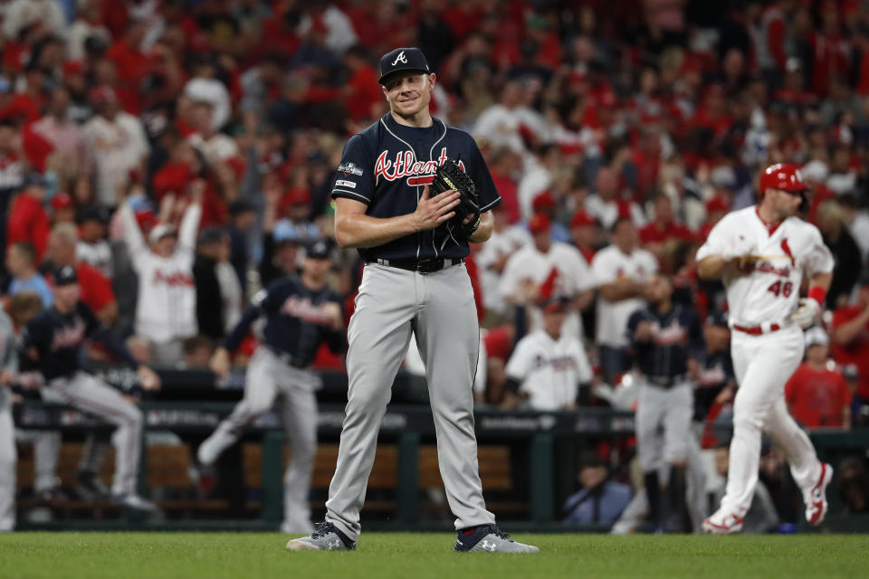 Atlanta Braves relief pitcher Mark Melancon celebrates the team's 3-1 victory over the St. Louis Cardinals in Game 3 of a baseball National League Division Series on Sunday, Oct. 6, 2019, in St. Louis. (AP Photo/Jeff Roberson)s