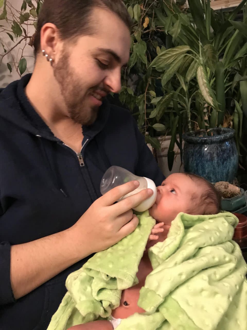 A transgender man has given birth to a healthy baby - five years after having his first child while living as a woman. Photo: MEGA