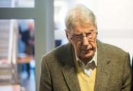 Former Auschwitz guard Reinhold Hanning arrives for his trial at the court in Detmold, western Germany on February 11, 2016