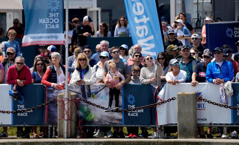 Sailing fans line up to see the boats off from Fort Adams in Newport on Sunday afternoon.  